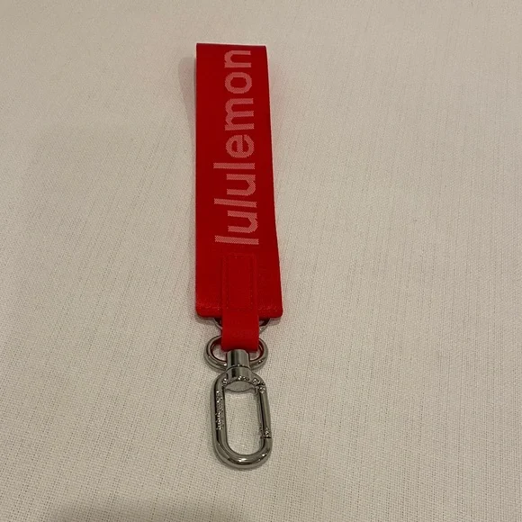 Red Lululemon Never Lost Keychain - Picture 3 of 3